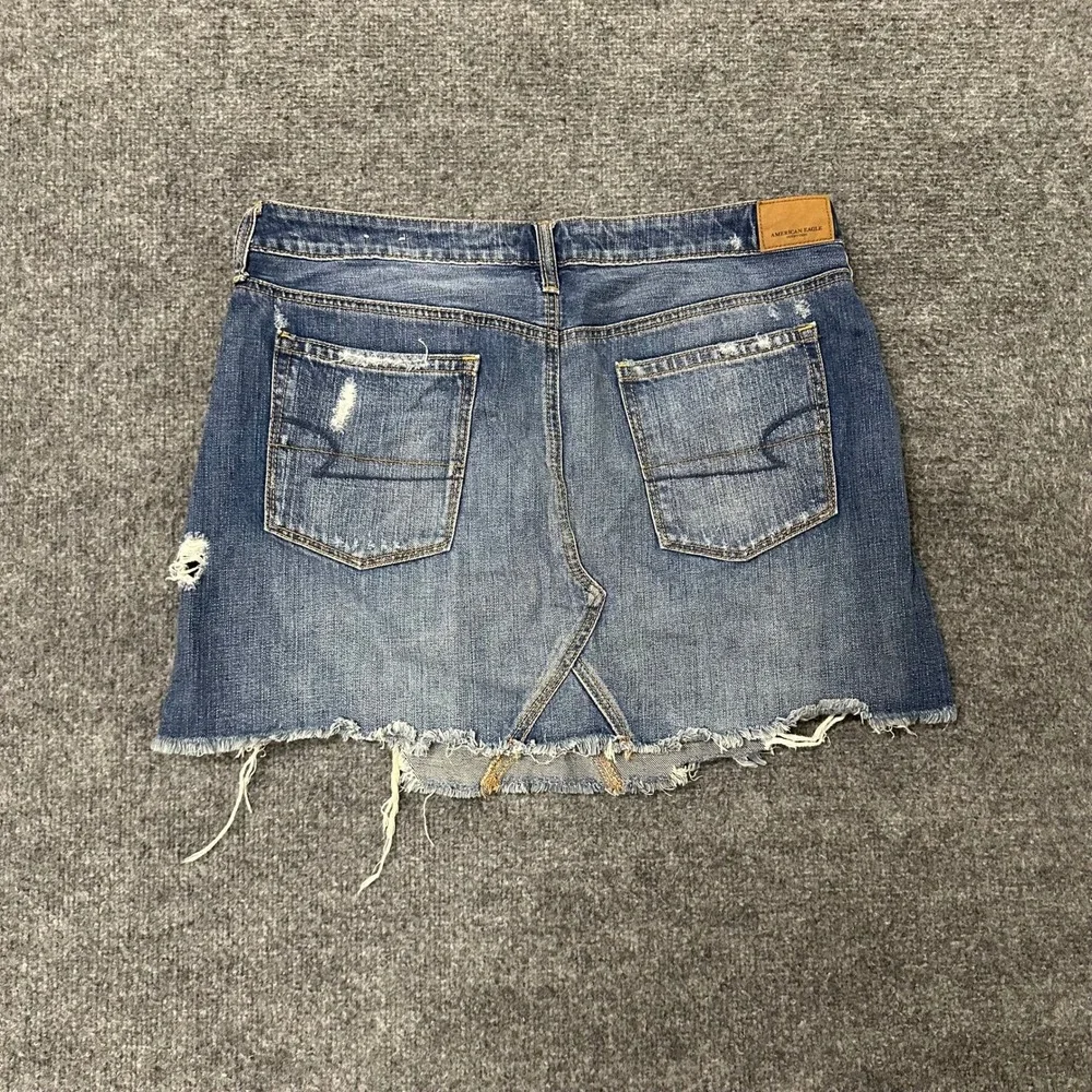 American Eagle Denim Skirt Womens Size 14 Blue Distressed Raw Hem Cotton Mini